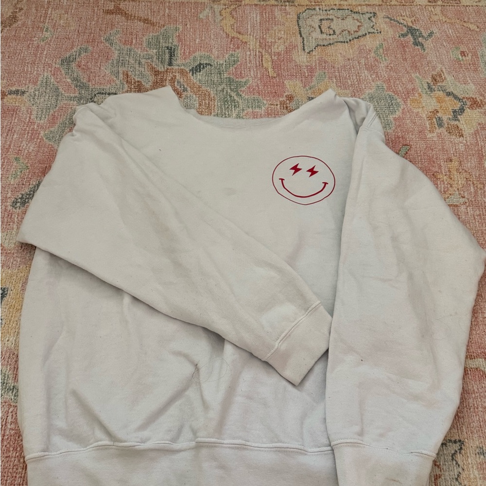 White Sweatshirt with Red Smiley Face